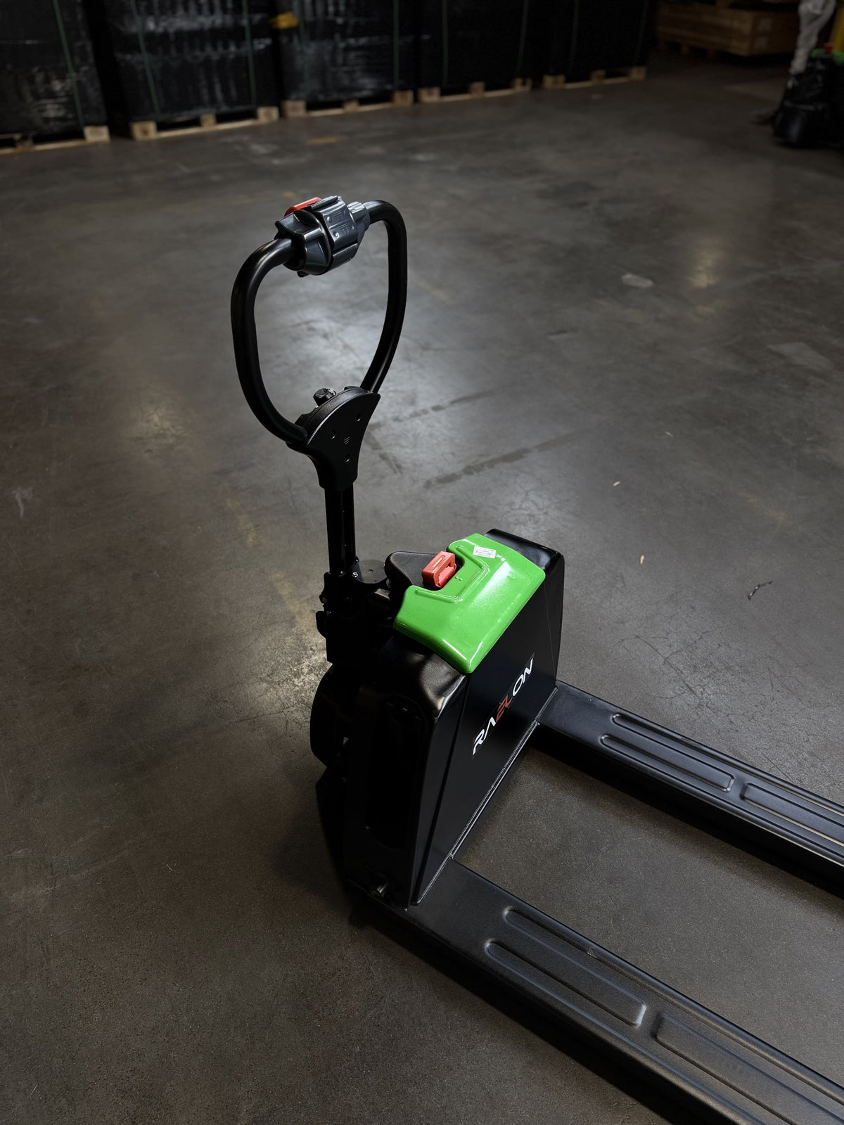 Angled view of Raelon F4 electric pallet jack handle and machine body